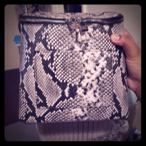 Aldo black and white snakeskin backpack/handbag